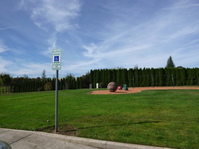 Accessible parking sign and playground